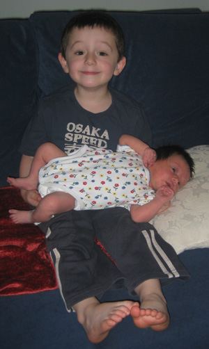 Callum holding Annabelle